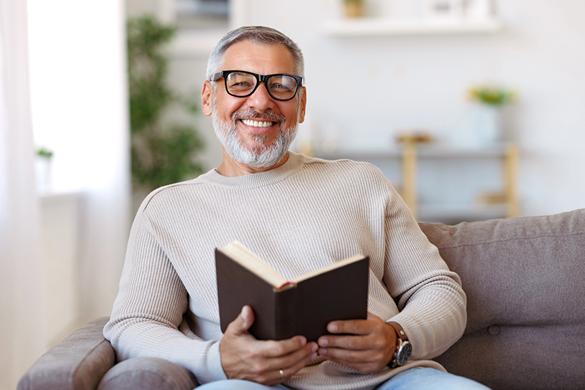 Portrait of happy senior man with grey hair