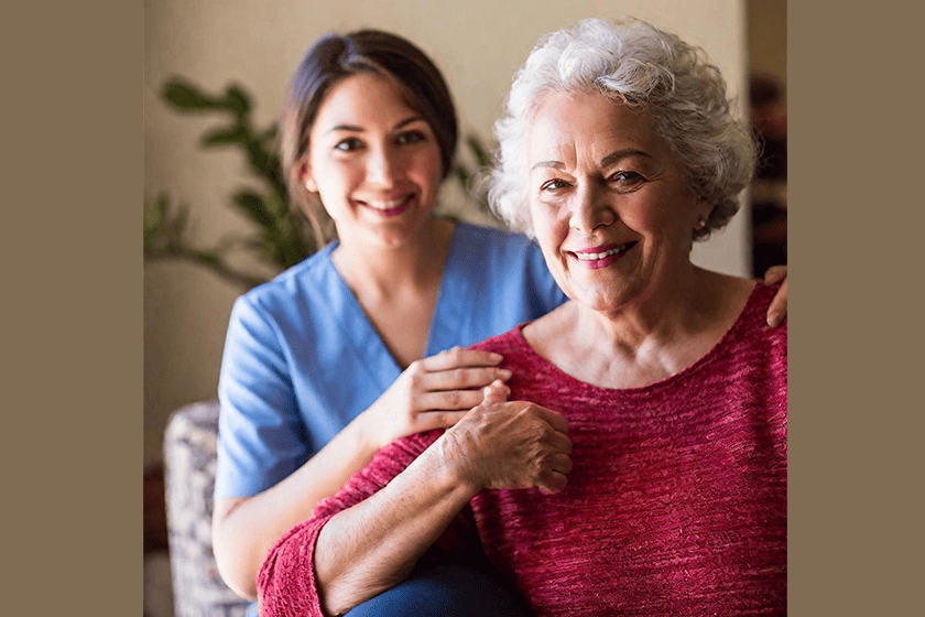 Senior woman hugging her grandmother 